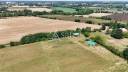 Terrain ind&eacute;pendant avec hangar et station de forage