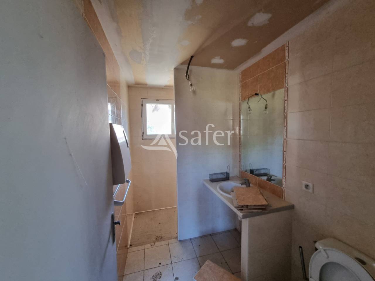 Maison et dépendances sur 9ha proche de Madiran