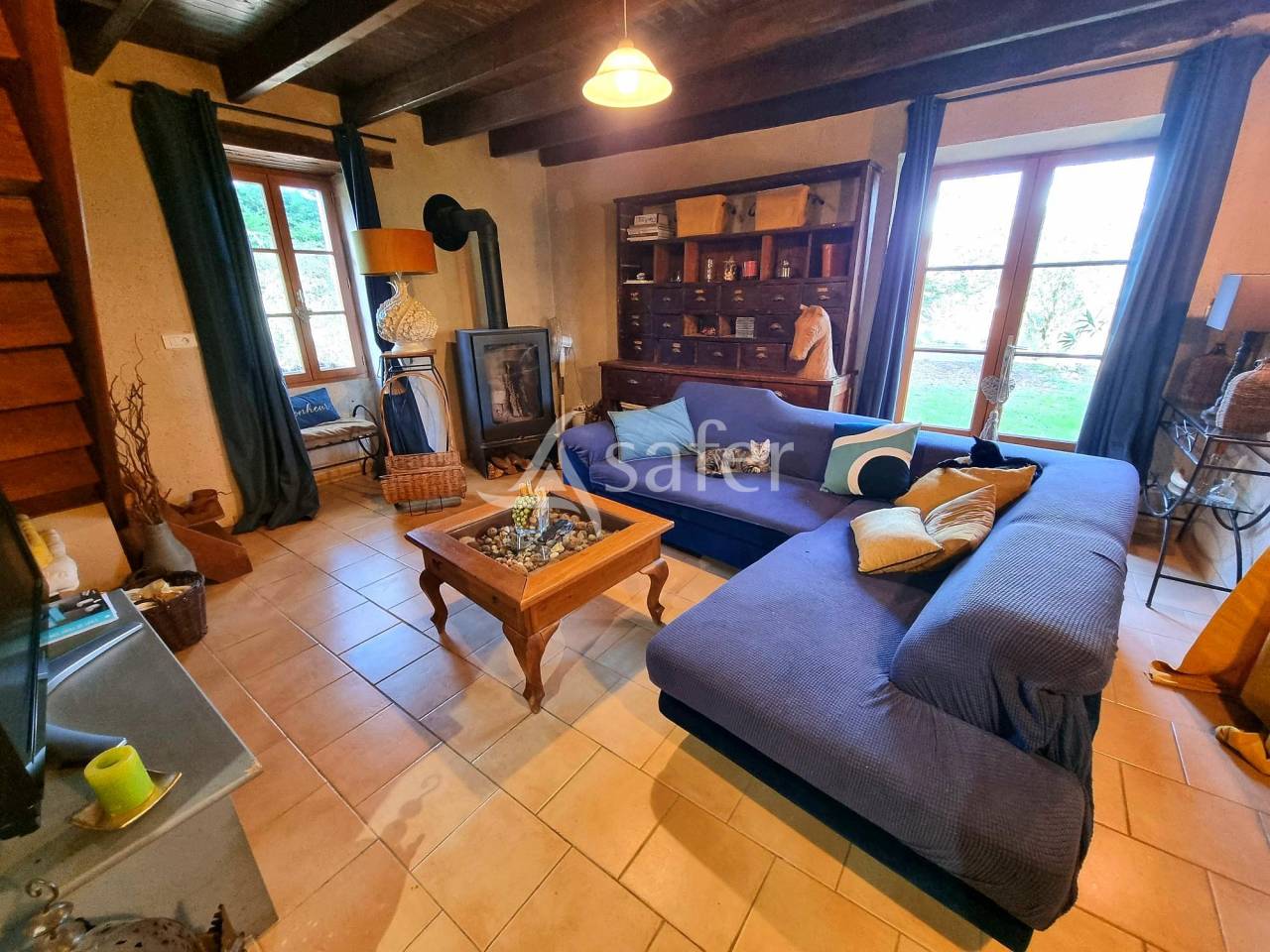 Petite exploitation à vocation élevage avec atelier transforma